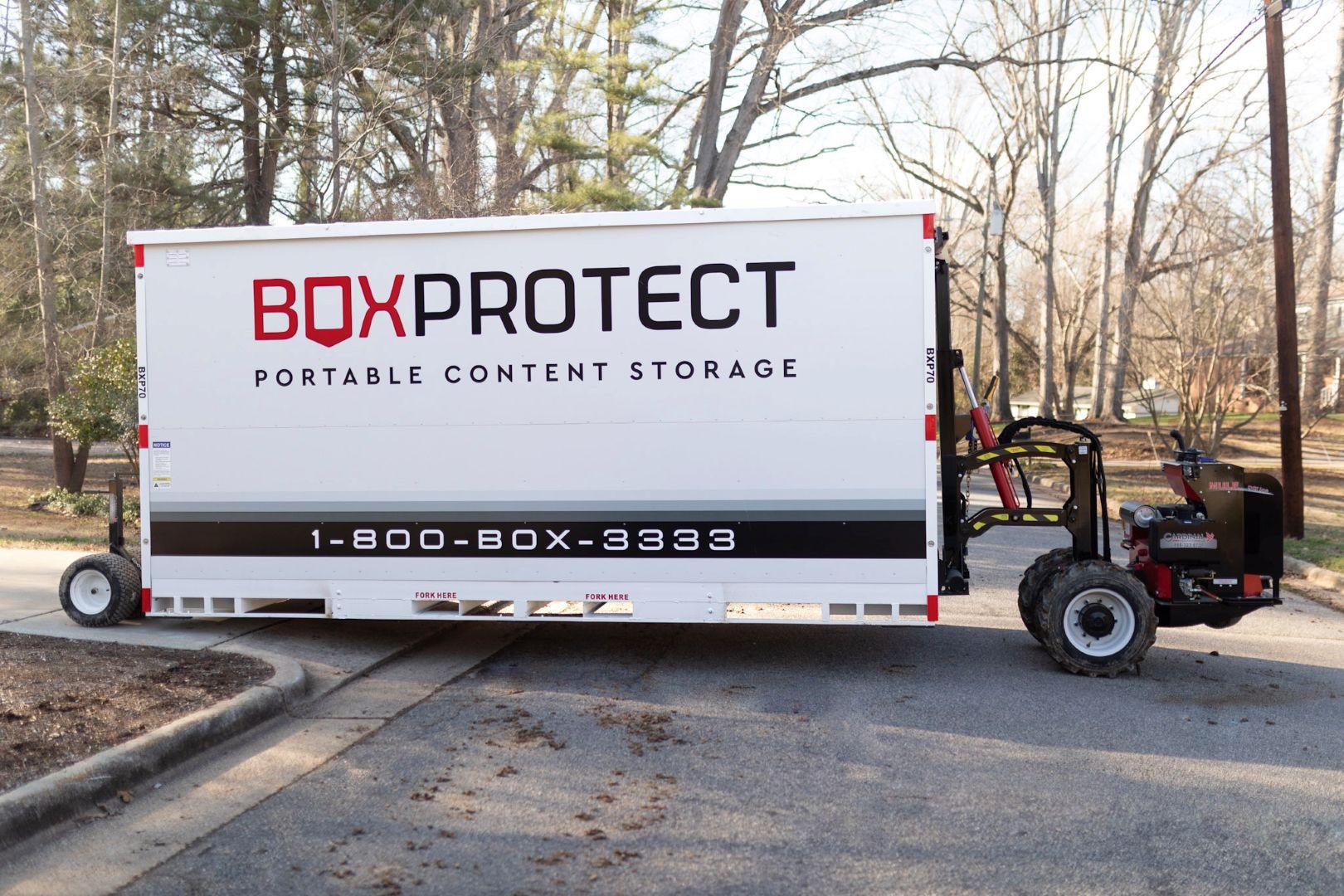 BoxProtect Zero-Point Turn Mule System transporting storage container